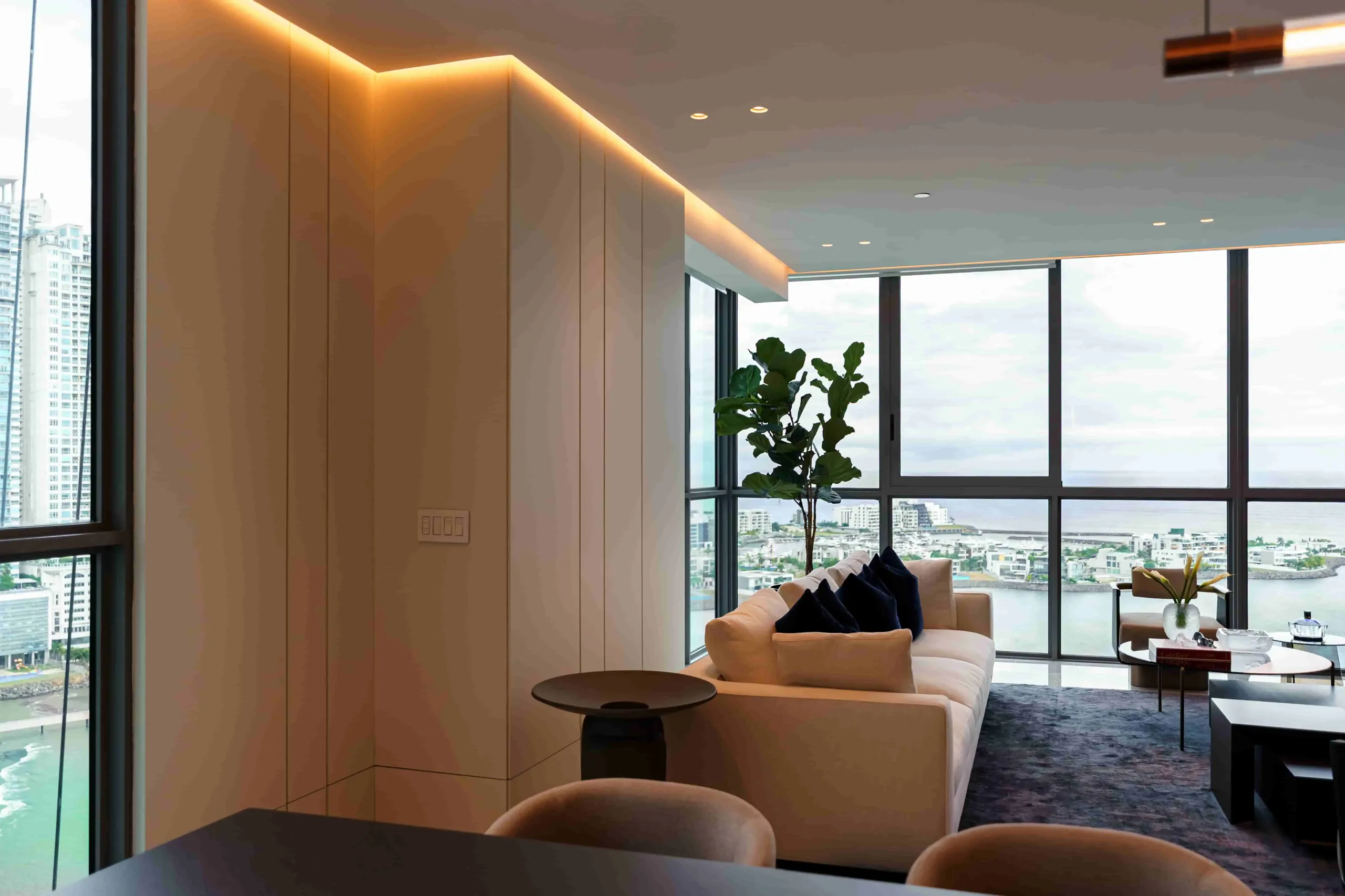 Luxury apartment living room with custom furniture and an ocean view in Panama