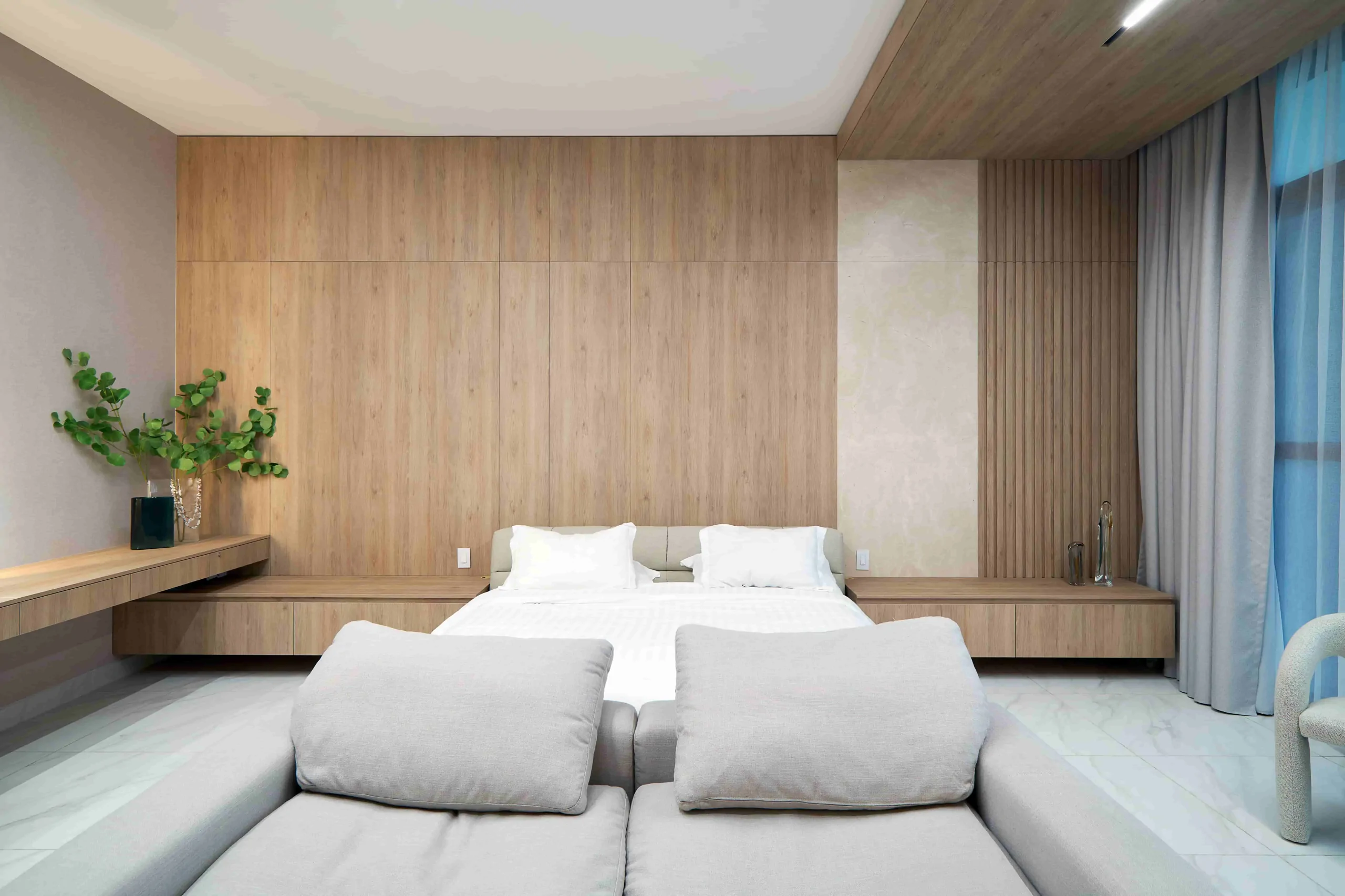 Primary suite with natural wood panels