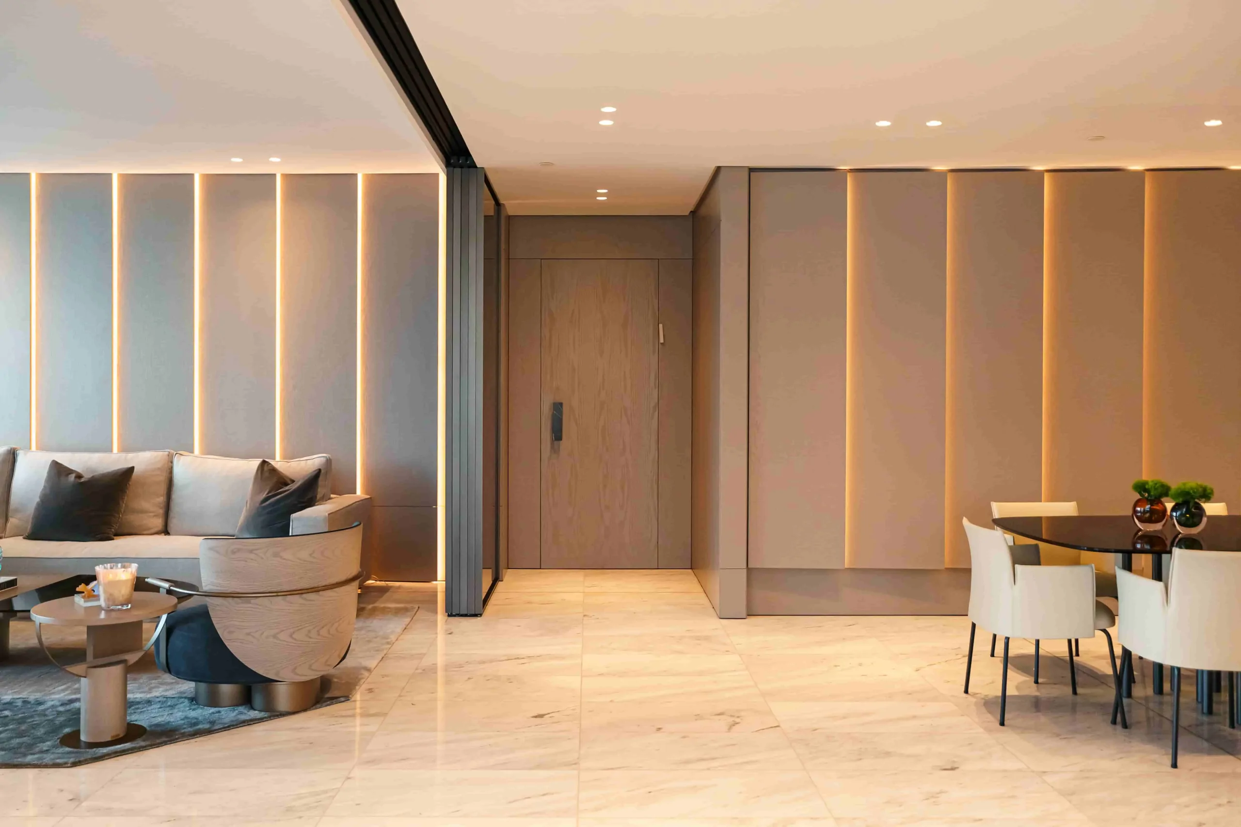 Wood paneling with LED lighting in a living and dining room in Panama